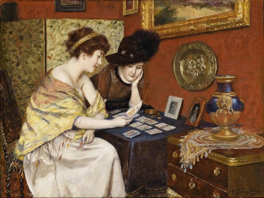 'What’s in the Cards’ (1911) di Paul Spangenberg, opera di pubblico dominio.